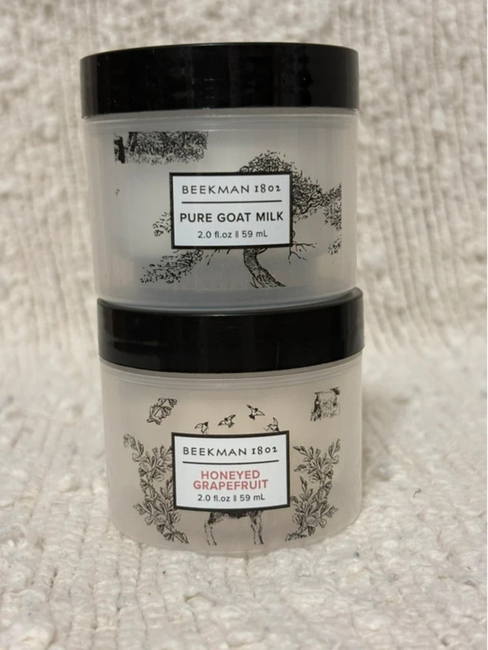 Set of three 2.0 fl. oz. Beekman 1802 Whipped Body Cream jars.